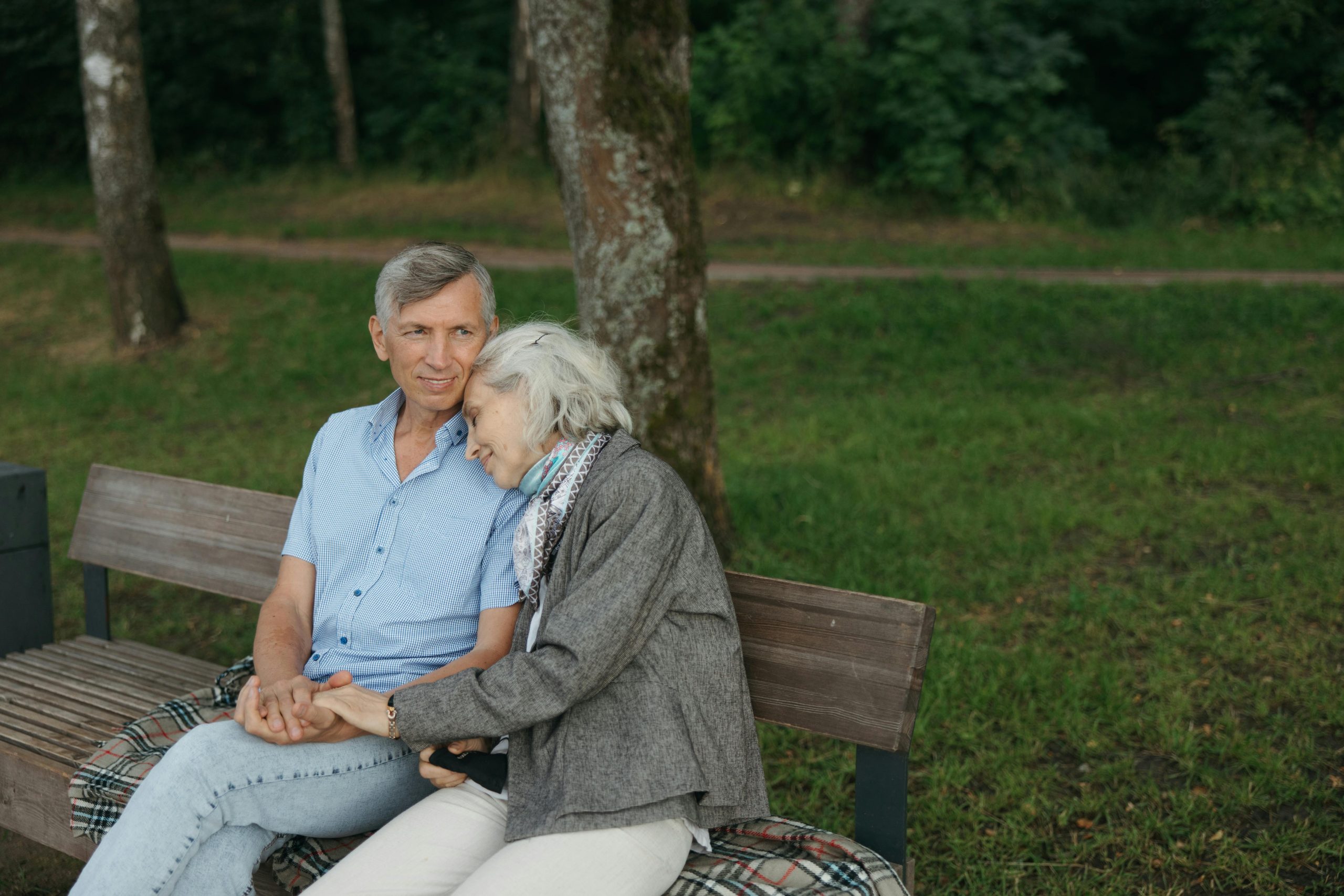 Elderly couple sitting on a bench