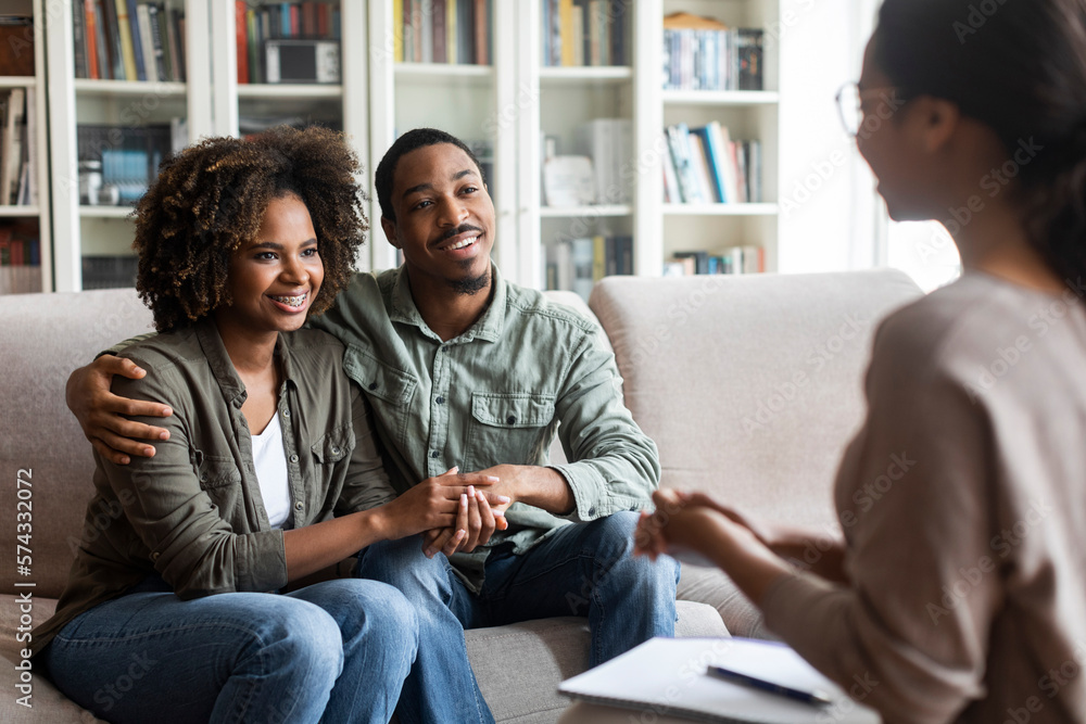 happy-black-couple-sitting-in-counselor-office-successful-marital-therapy-stockpack-adobe-stock Happy black couple sitting in counselor office, successful marital therapy